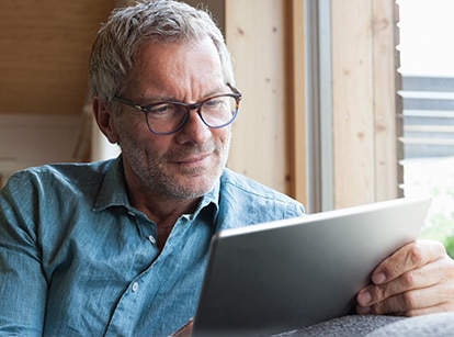 Person reading tablet
