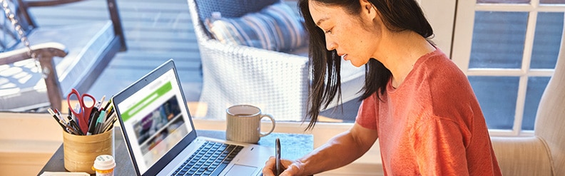 Person on a laptop learning about natural medicines